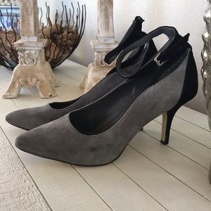Gray and black suede pumps